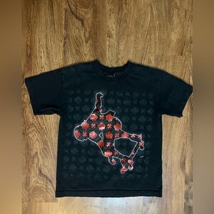 Black and red skater tee with a unique graphic. Boys size L (10/12)